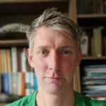 Headshot of journalist Chris Simms
